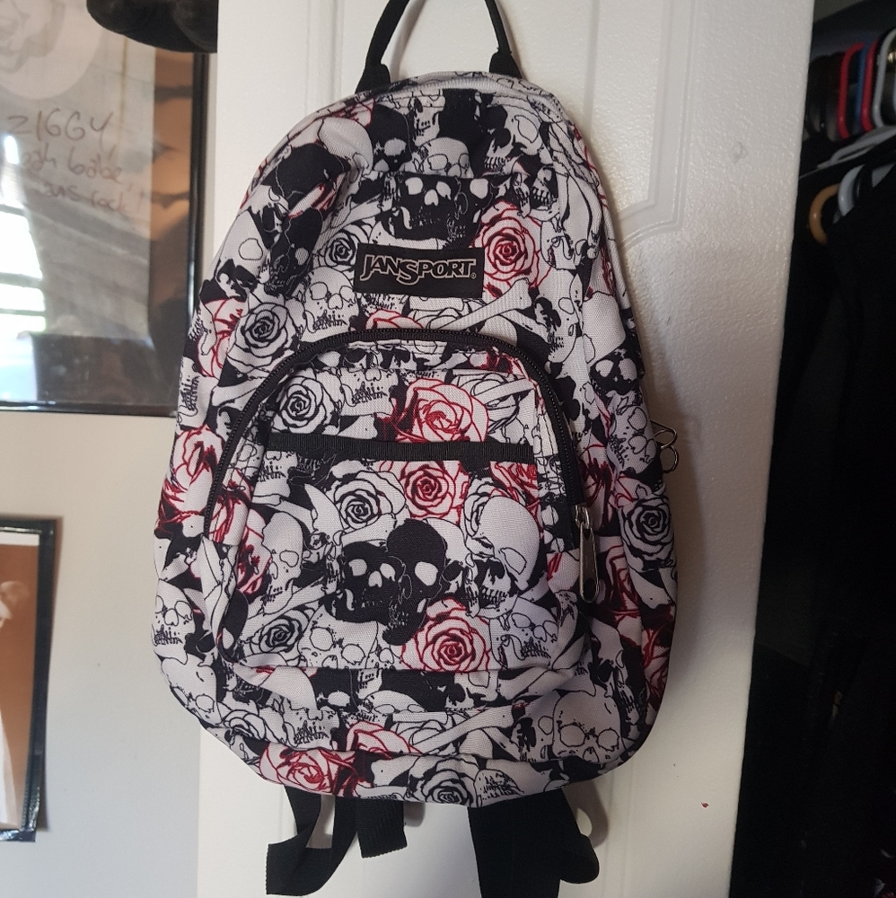 jansport skull and roses mini backpack